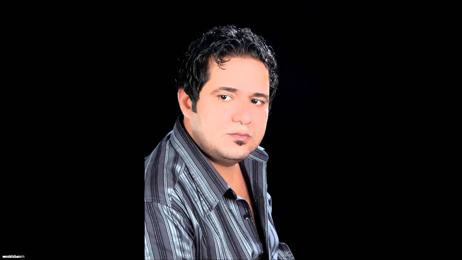 كلمات أغنية أموت بحضنك | حاتم العراقي